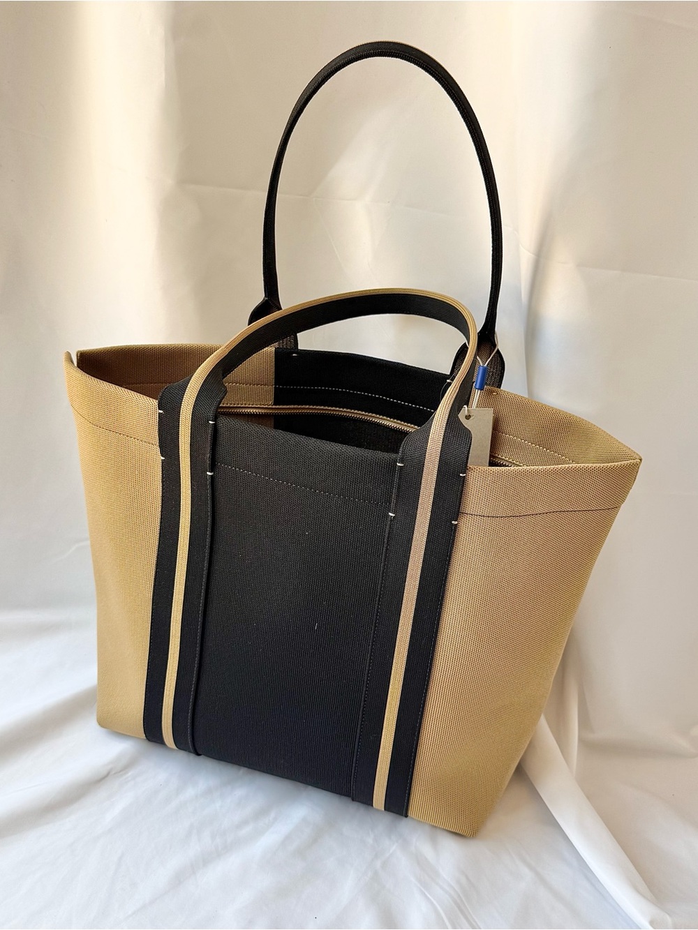Rothy’s Essential Tote Bag in Camel and Black